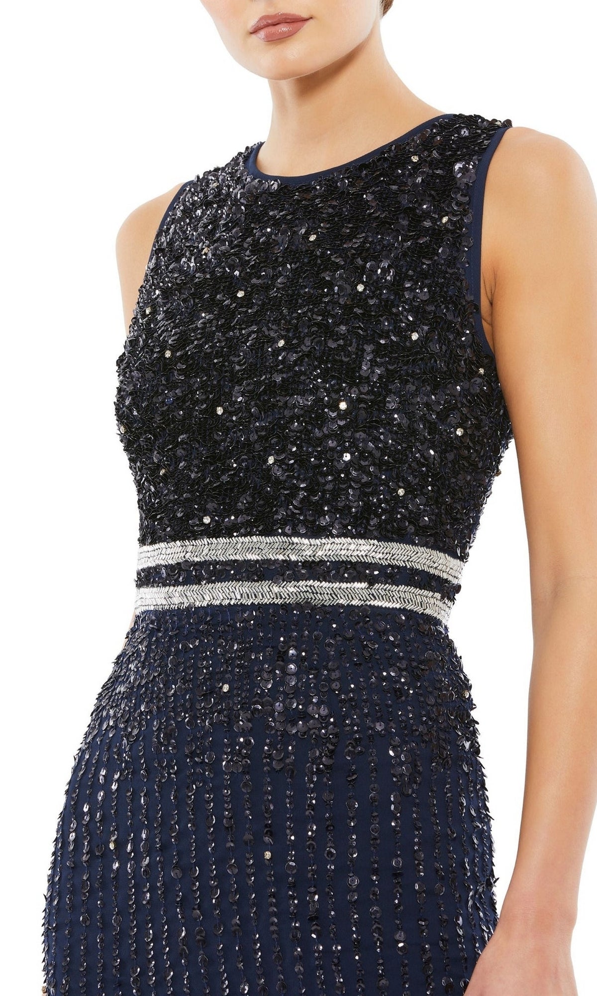 A woman models the Mac Duggal 10509 Short Sequin Wedding Guest Dress—a sleeveless navy dress with black sequins and a silver-striped waistband; the photo is cropped at the neck and below the hips.